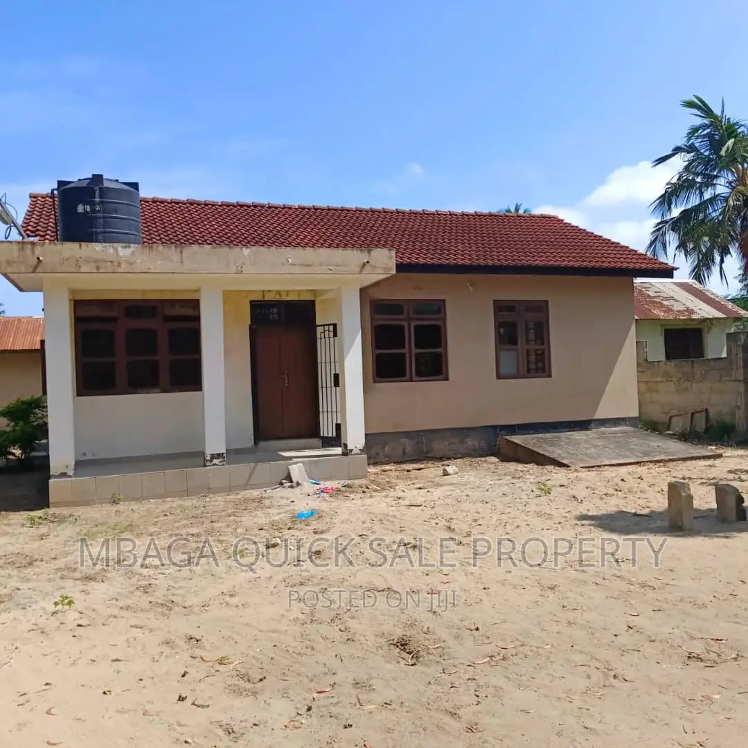 Plot for Sale at Ununio With Small 3 Bed Room House in Bunju