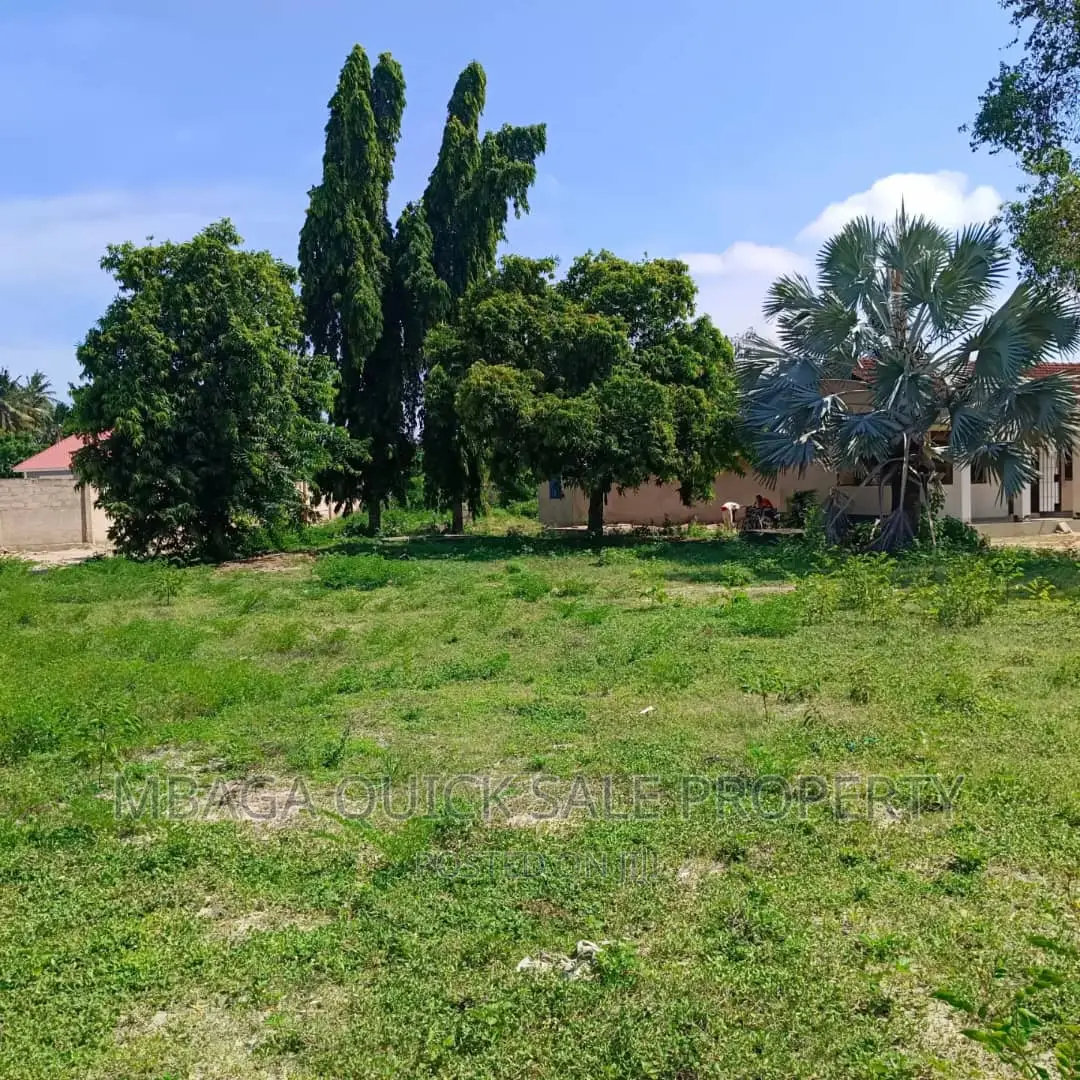 Plot for Sale at Ununio With Small 3 Bed Room House in Bunju