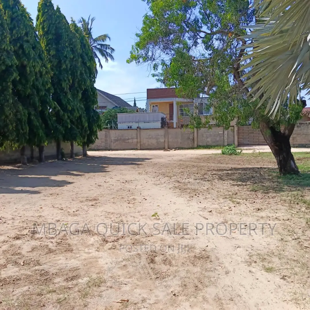 Plot for Sale at Ununio With Small 3 Bed Room House in Bunju