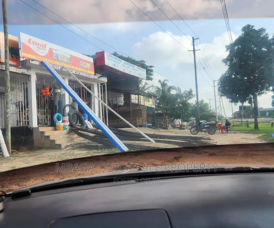 Plot Along Main Road With 2 Shop for Sale TSH 70mil at Madal in Bunju