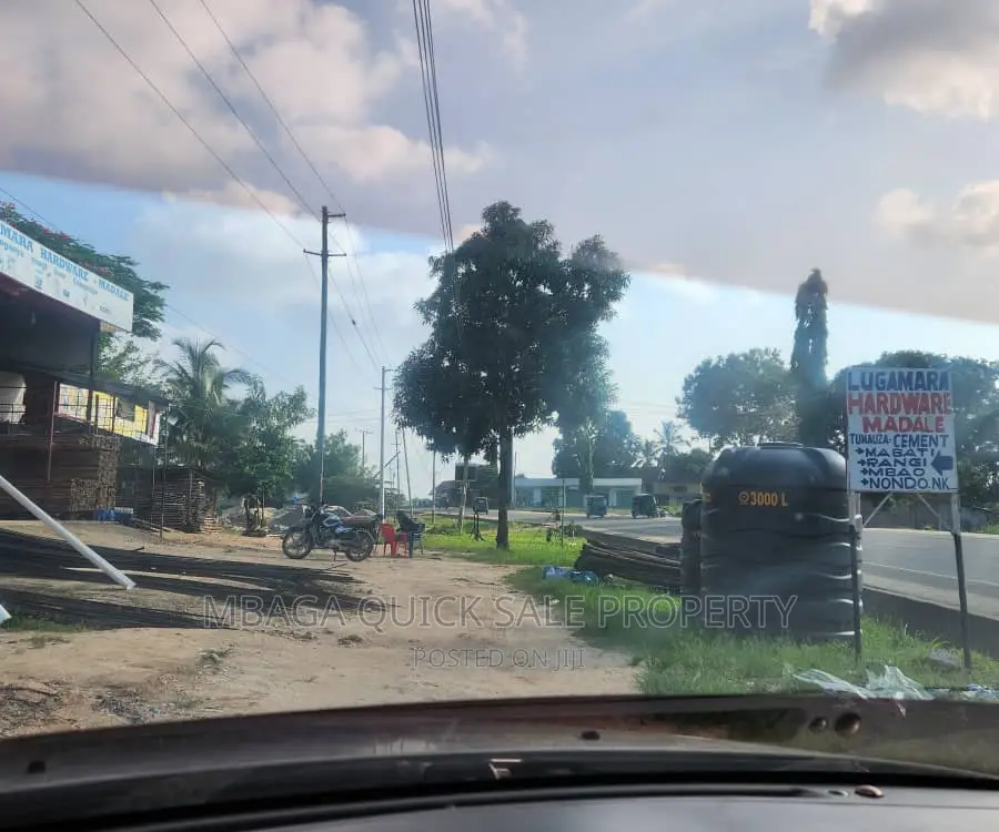 Plot Along Main Road With 2 Shop for Sale TSH 70mil at Madal in Bunju