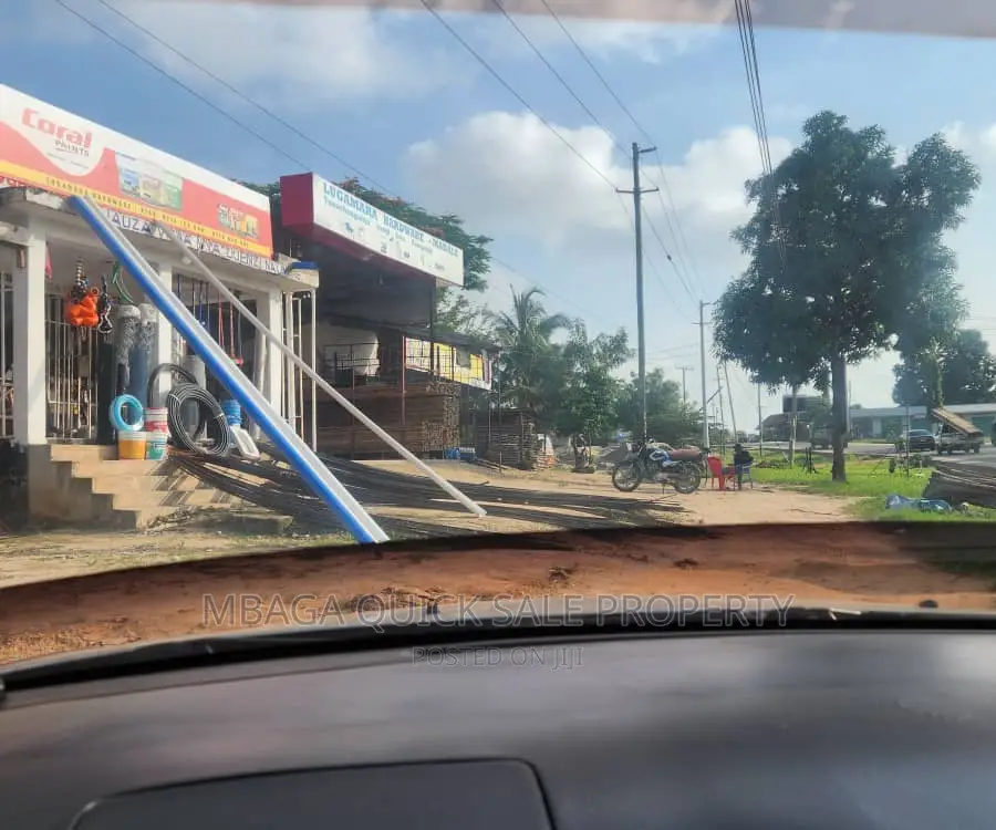 Plot Along Main Road With 2 Shop for Sale TSH 70mil at Madal in Bunju