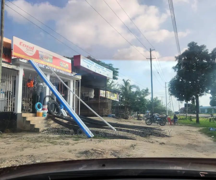 Plot Along Main Road With 2 Shop for Sale TSH 70mil at Madal in Bunju