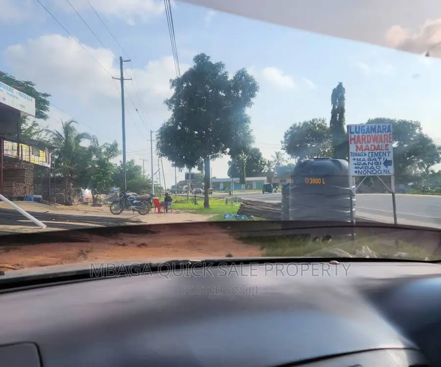 Plot Along Main Road With 2 Shop for Sale TSH 70mil at Madal in Bunju