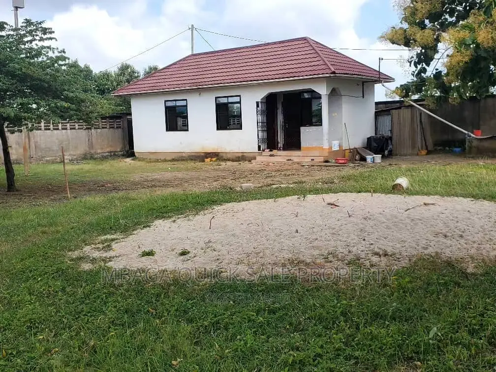 Big Plot for Sale With Small House at Tegeta Wazo Hill in Bunju