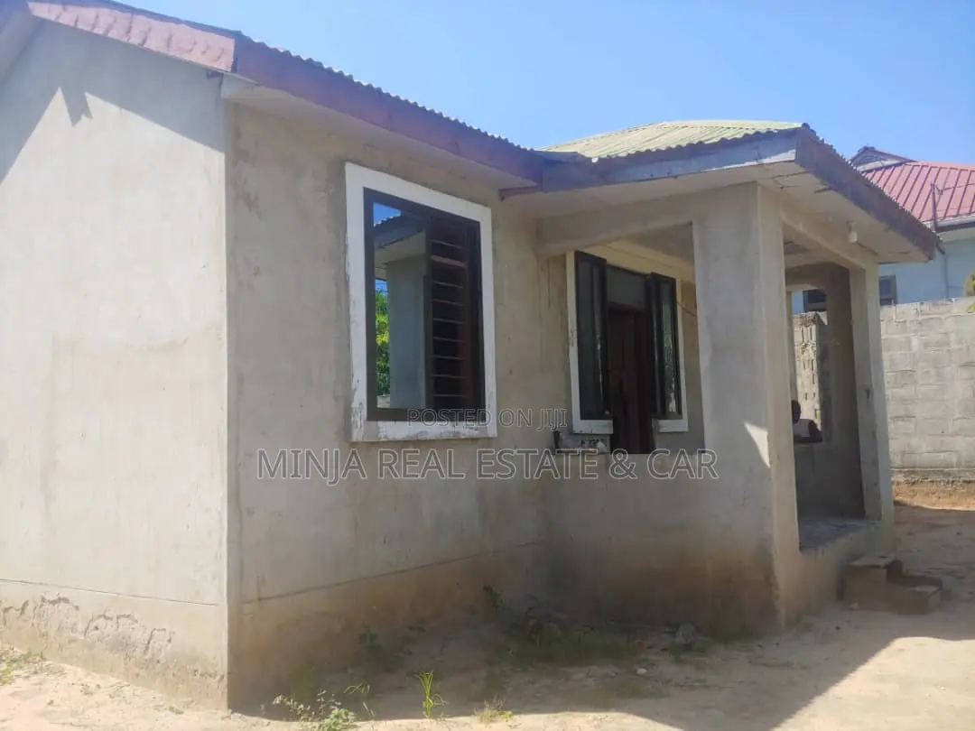 Plot For Sale With Small House For Sale In Bunju in Bunju