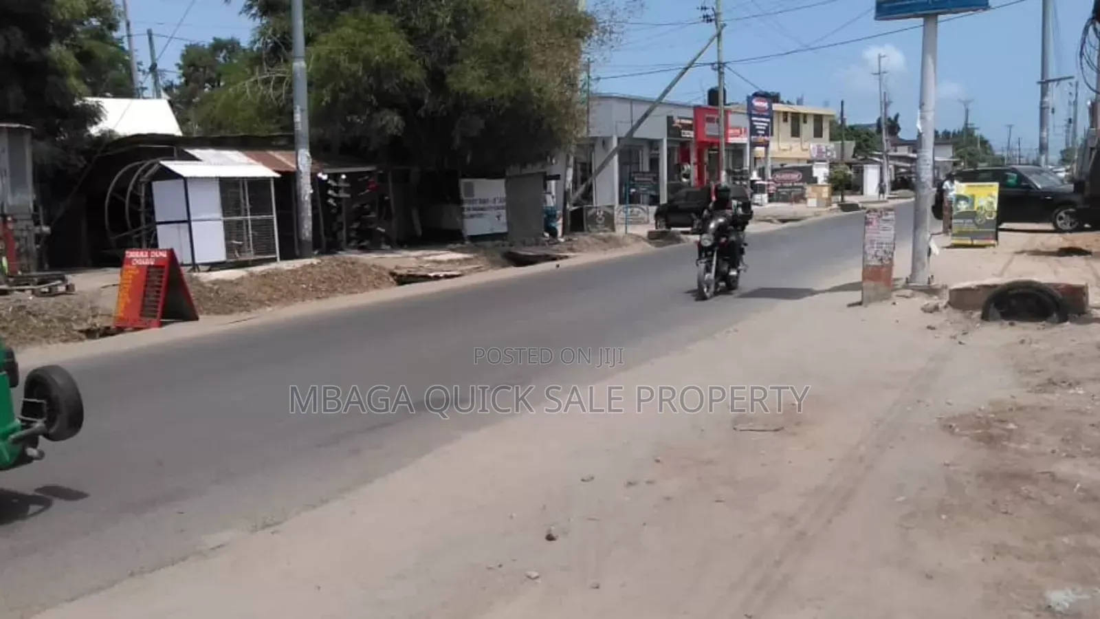Yard / Showroom/ Car Wash for Rent at Msasani Main Road in Msasani