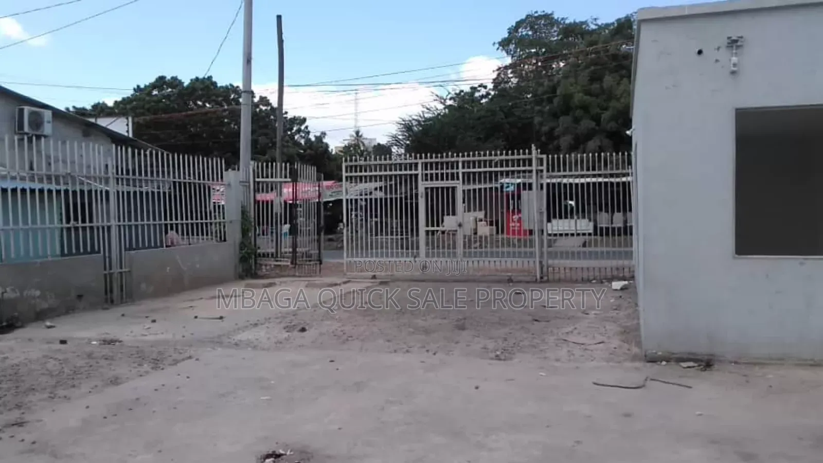 Yard / Showroom/ Car Wash for Rent at Msasani Main Road in Msasani