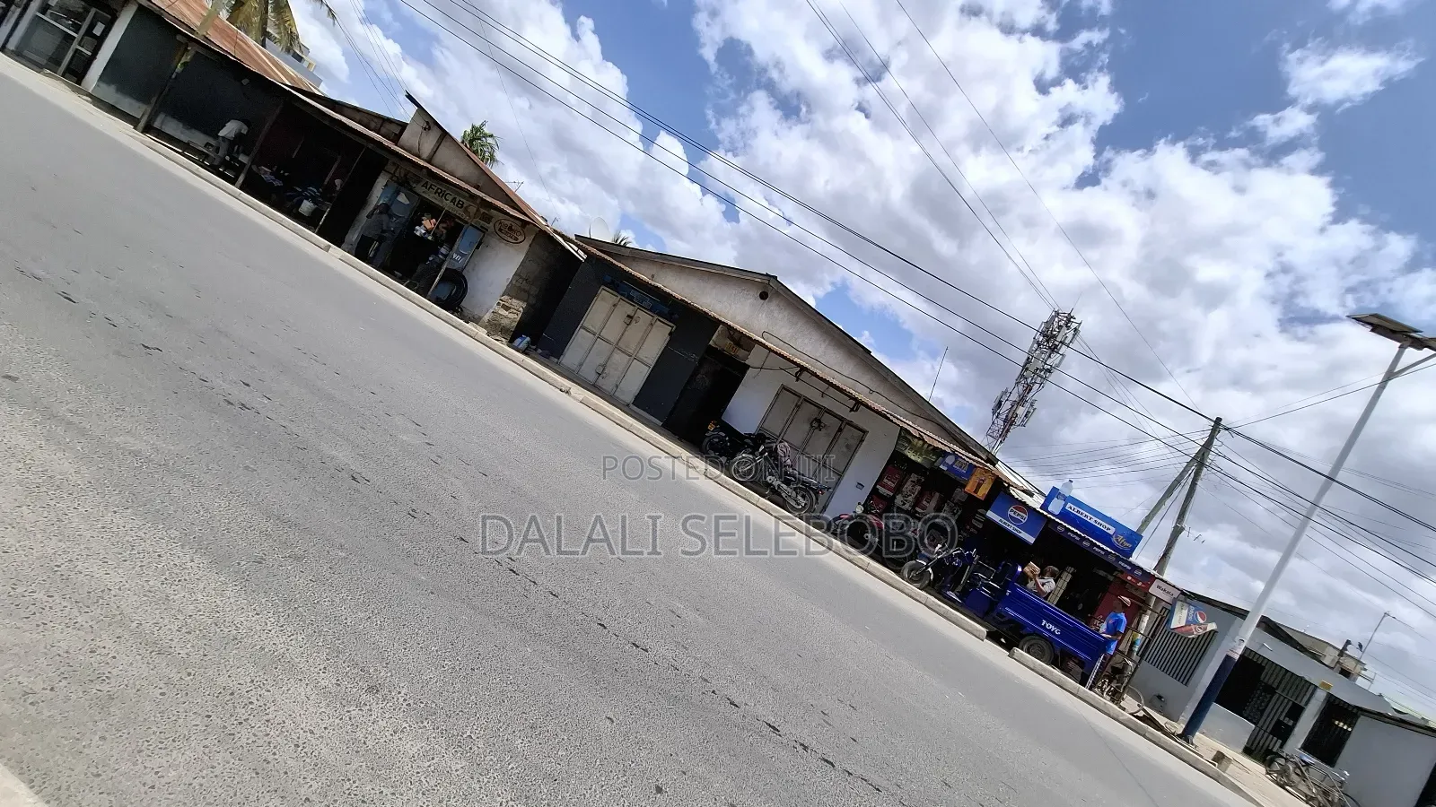 Plot We Look Main Road Tarmac Investment Area in Mwananyamala