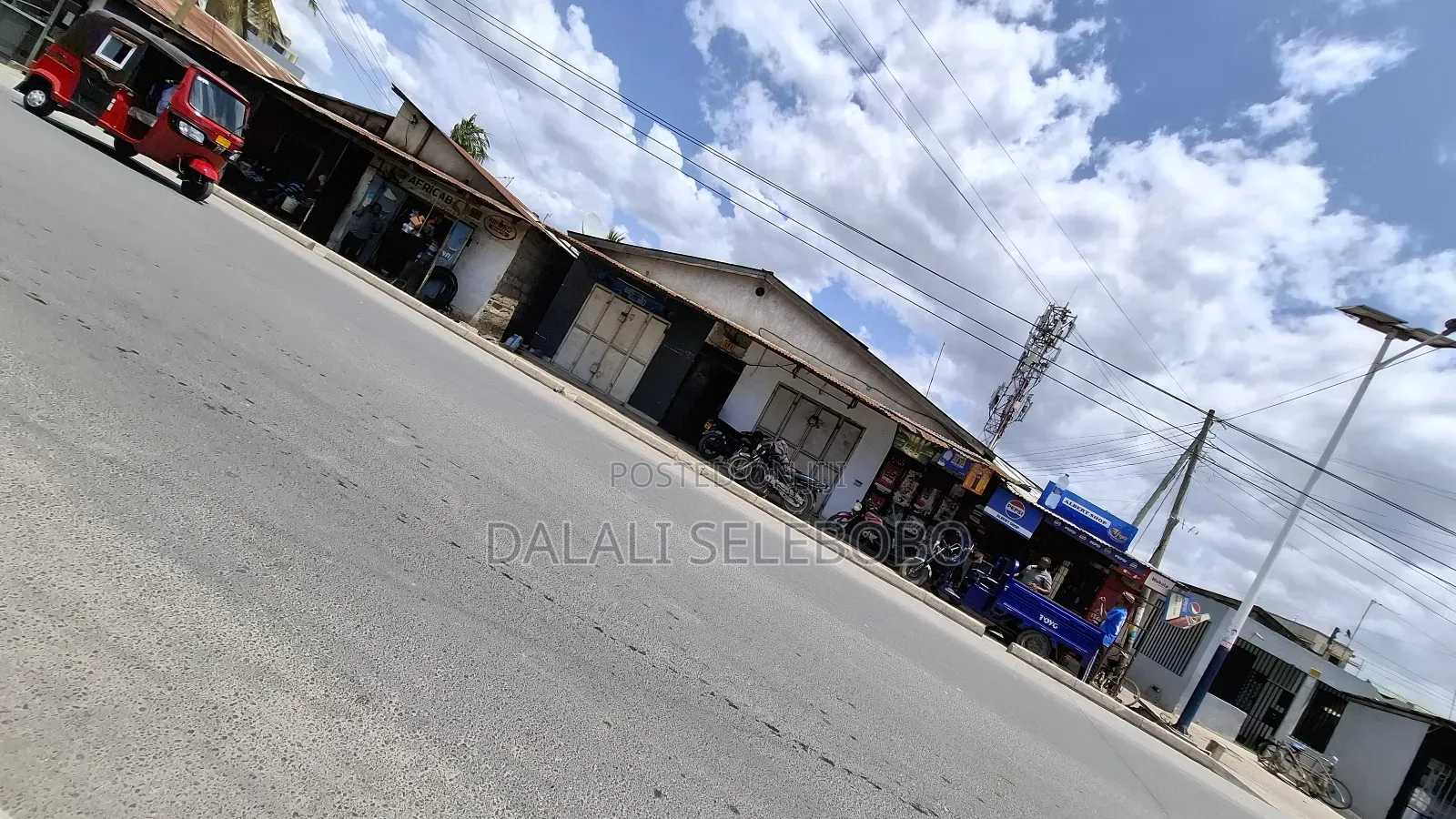 Plot We Look Main Road Tarmac Investment Area in Mwananyamala