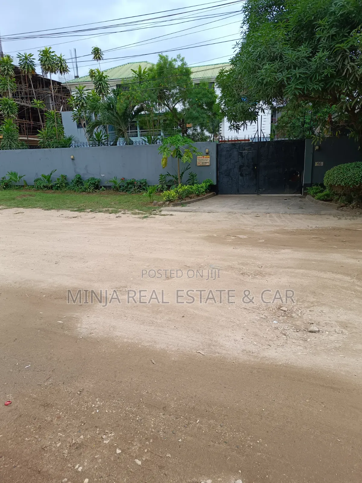 Plot for Sale in Masaki With the Building Inside the Compound in Masaki
