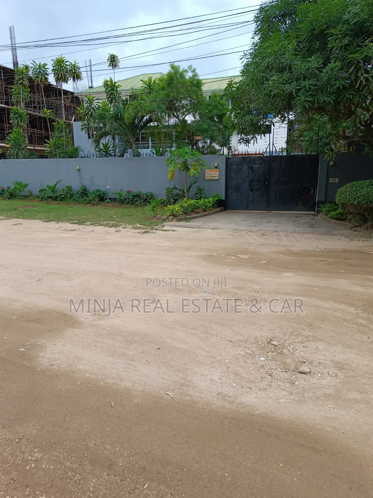 Plot for Sale in Masaki With the Building Inside the Compound in Masaki