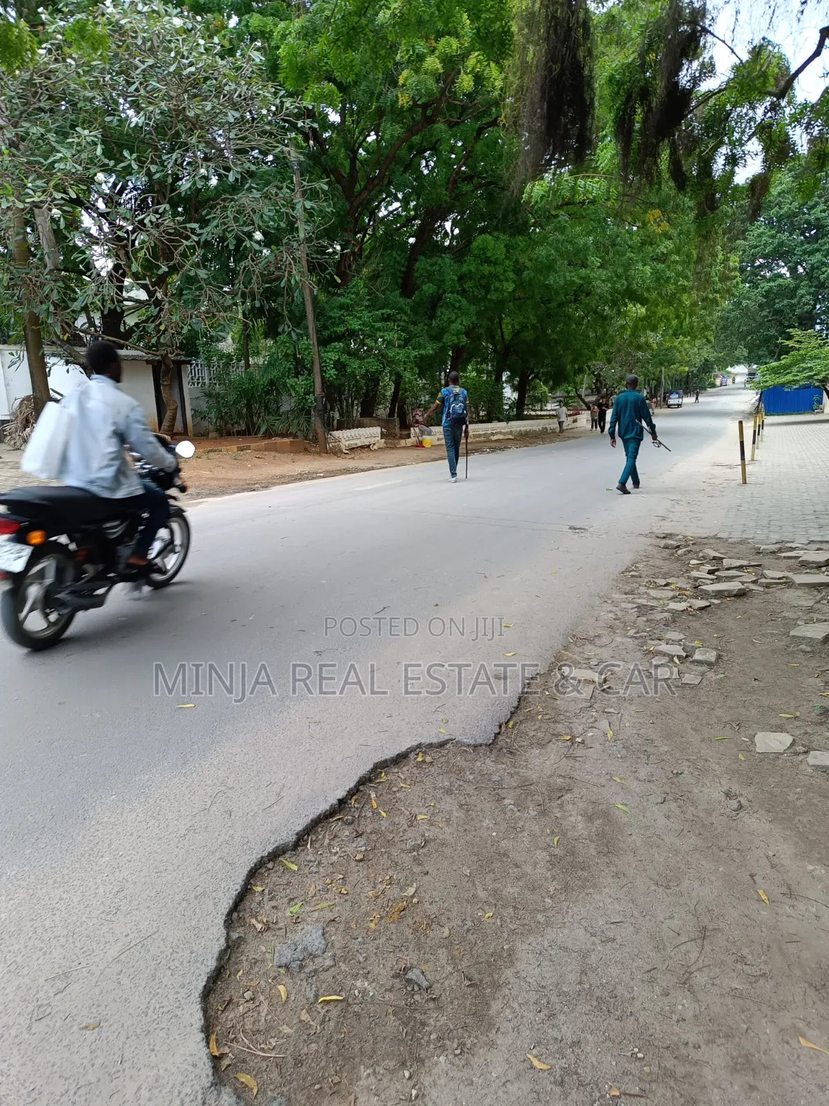 Plot for Sale in Masaki With 2 Floors Building in Masaki